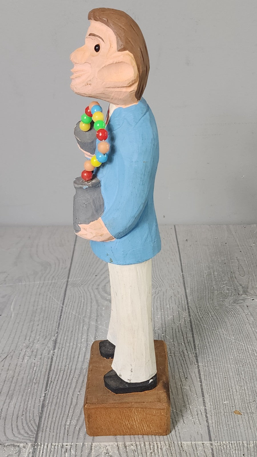 Vintage Hand Carved Wooden Statue Man Holding Cup-A-Ball Toy
