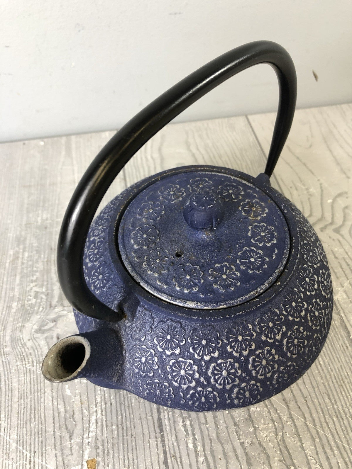 Cast Iron Ornamental Blue Teapot with Silver Flower Pattern and Black Handle