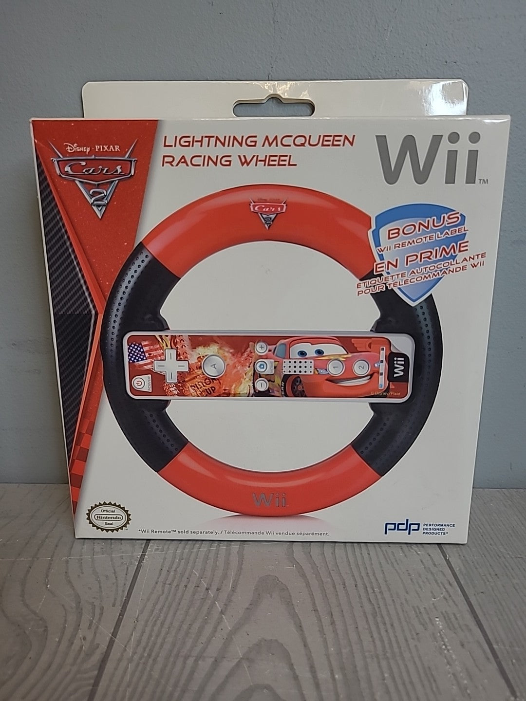 Nintendo Wii Lot White Console, Nerf Sports Pack, Cars 2 Wheel, and Misc Items