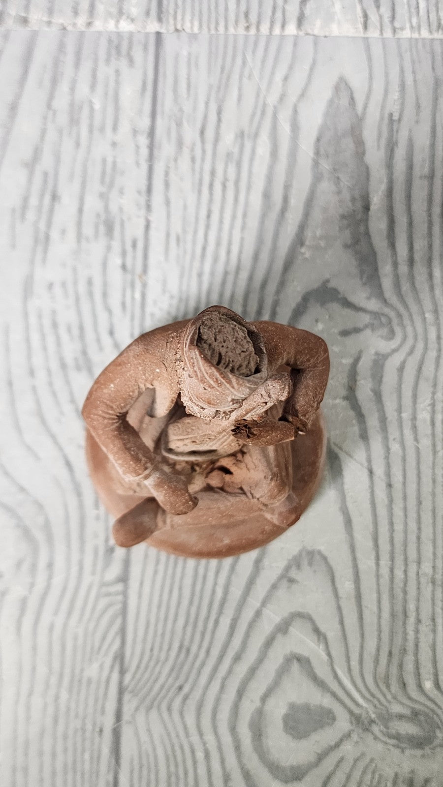 Hand Made Terracotta Sculpture of a Seated Man Playing Stringed Instrument Si