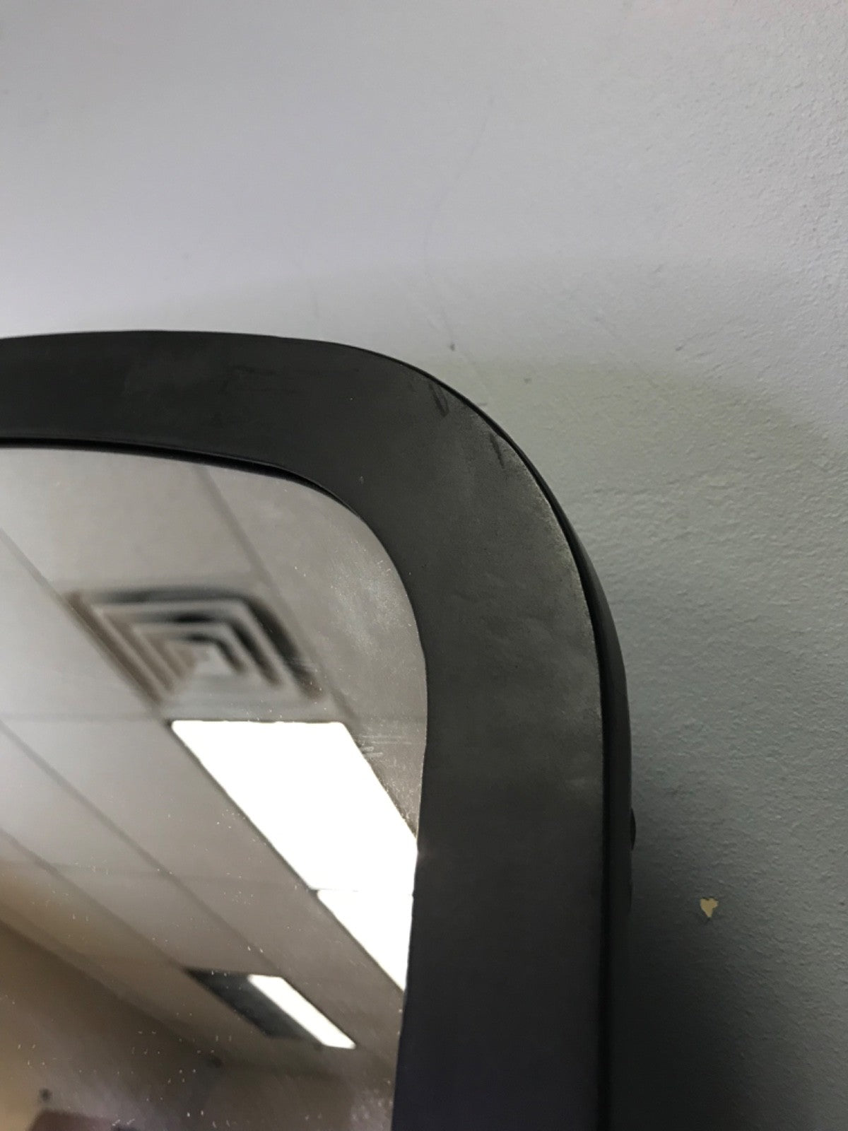 Kirkland's Home Black Metal Curved Dana Mantle Mirror