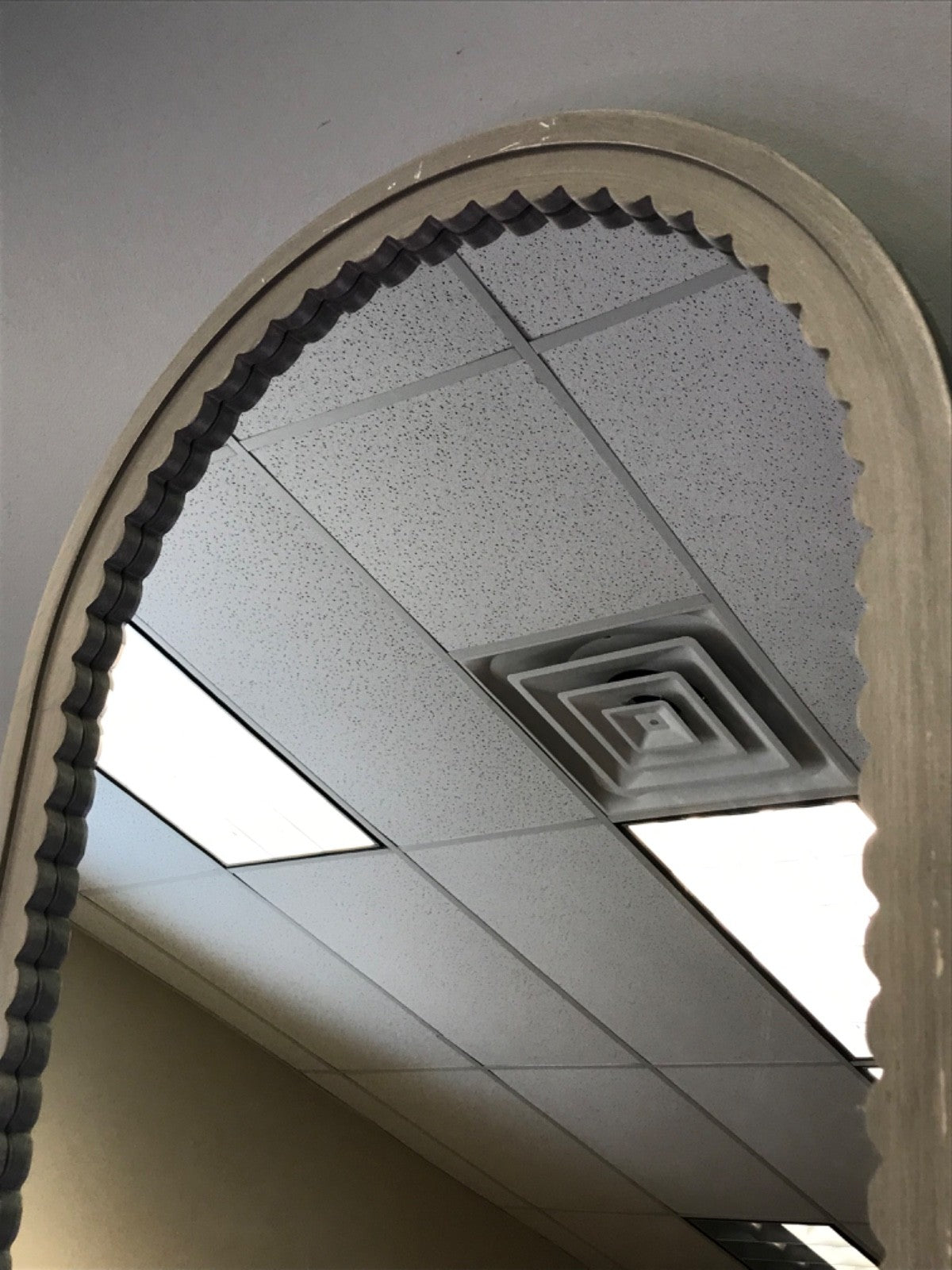 Kirkland's Home Grey “Emerson” Scalloped Oval Mirror