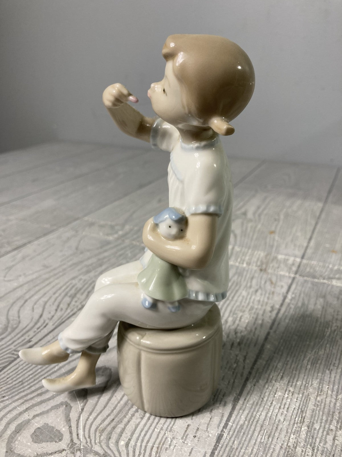 Lladro Porcelain Figurine Girl Trying on Lipstick No Box Gloss Finish