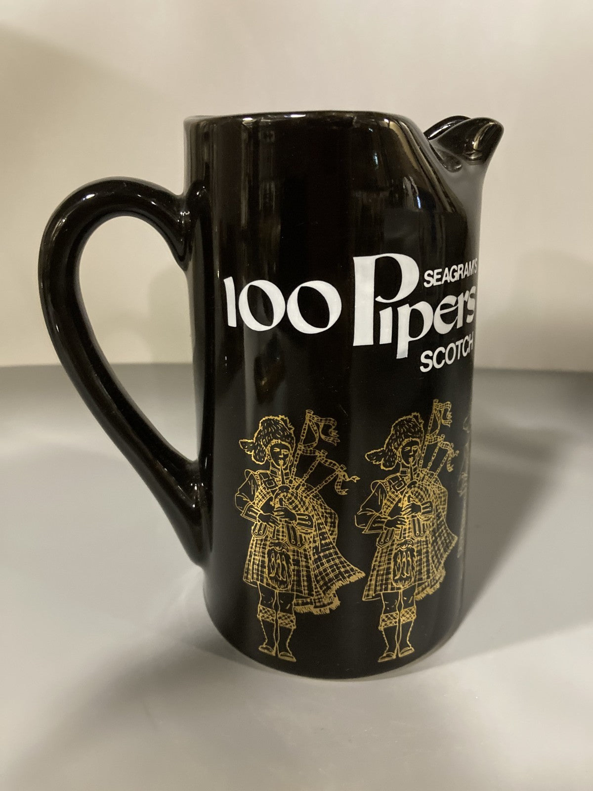 Vintage Collectible Ceramic Liquor Jug/Pitcher Seagram's 100 Pipers Scotch Black
