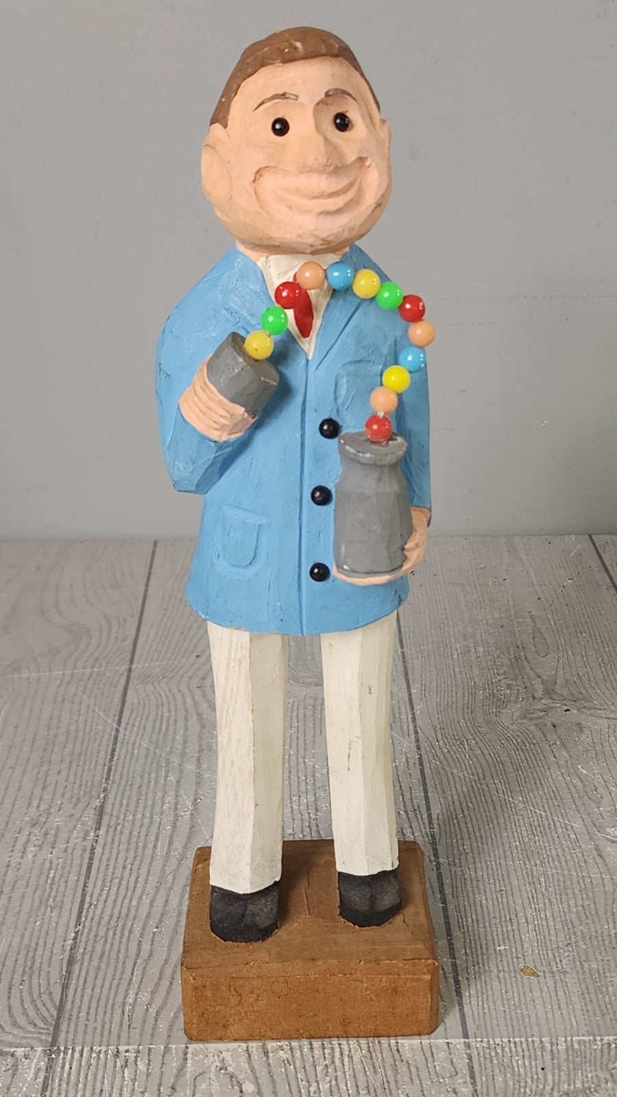 Vintage Hand Carved Wooden Statue Man Holding Cup-A-Ball Toy