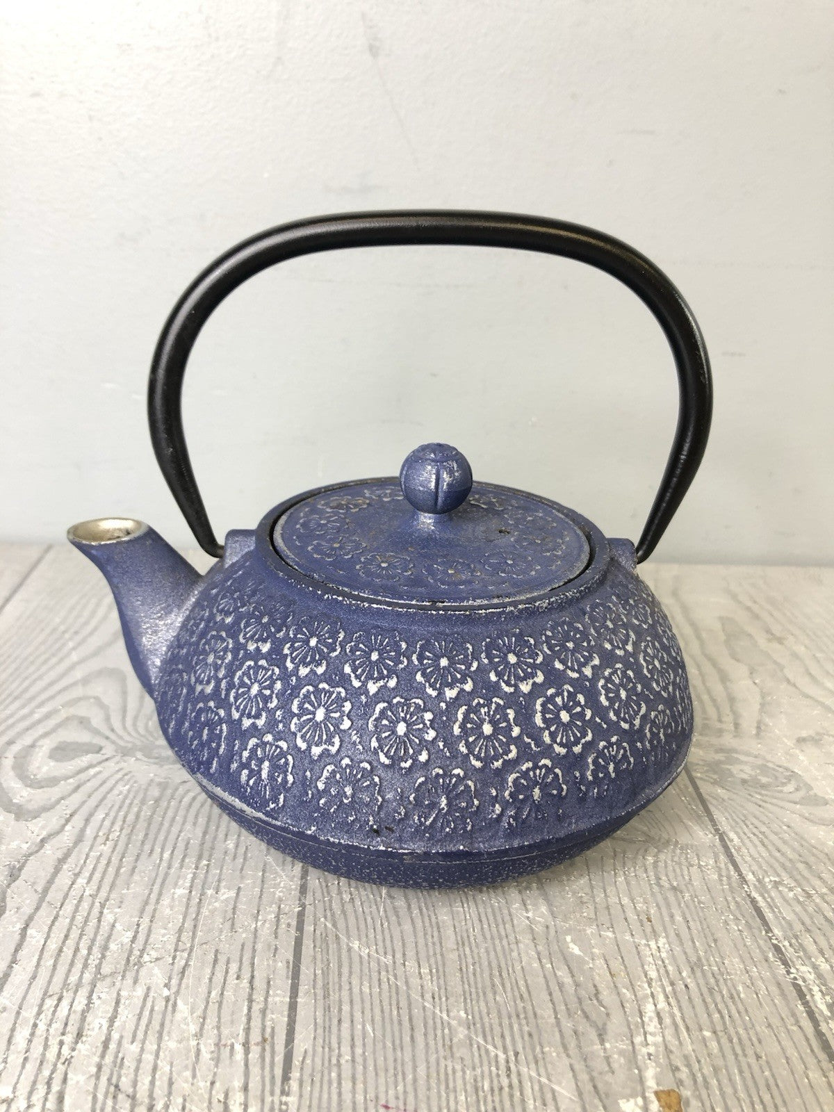 Cast Iron Ornamental Blue Teapot with Silver Flower Pattern and Black Handle