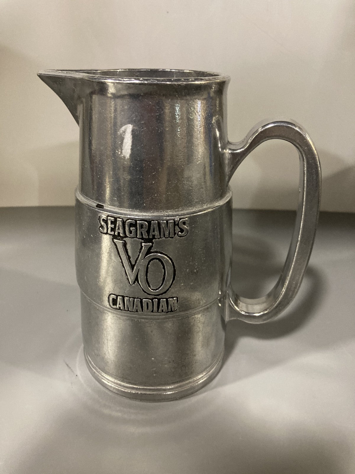 Vintage Collectible Ceramic Liquor Jug/Pitcher Seagram's Canadian VO Metal