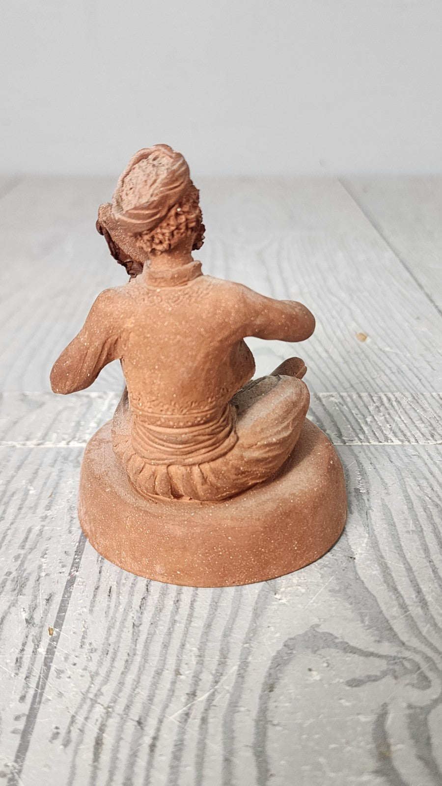 Hand Made Terracotta Sculpture of a Seated Man Playing Stringed Instrument Si