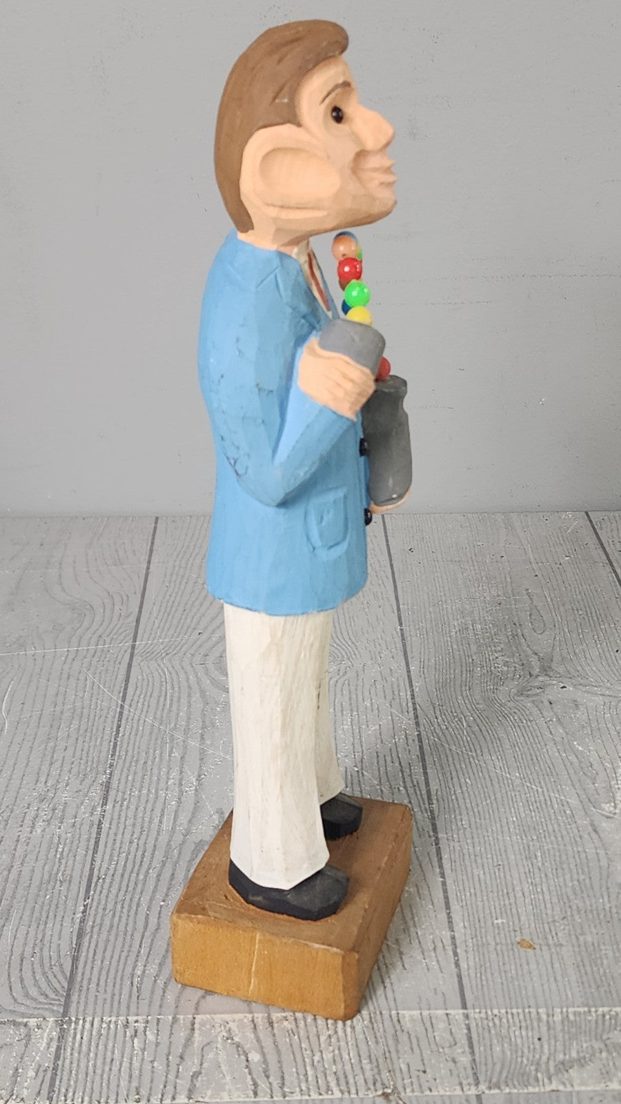 Vintage Hand Carved Wooden Statue Man Holding Cup-A-Ball Toy