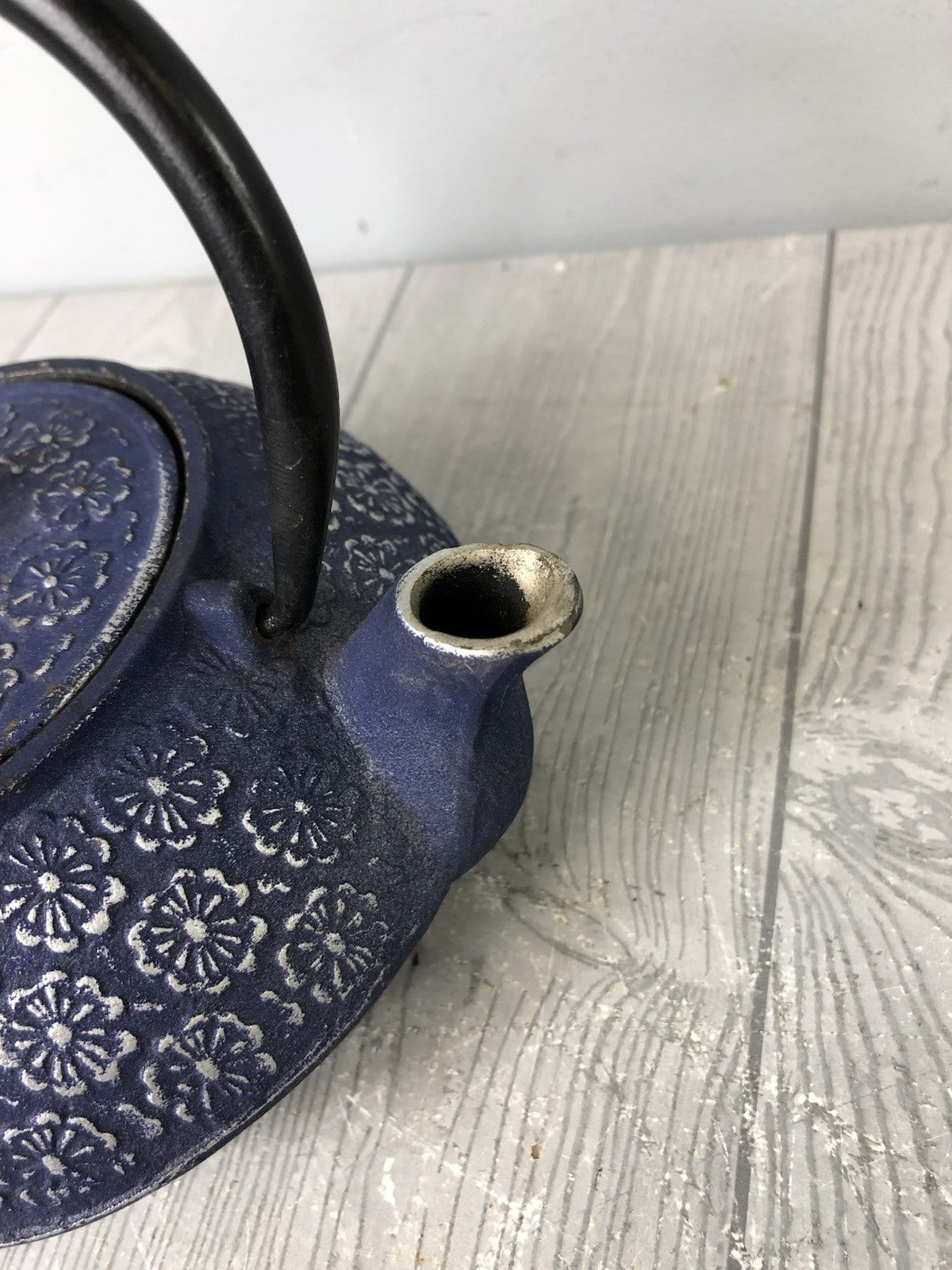 Cast Iron Ornamental Blue Teapot with Silver Flower Pattern and Black Handle
