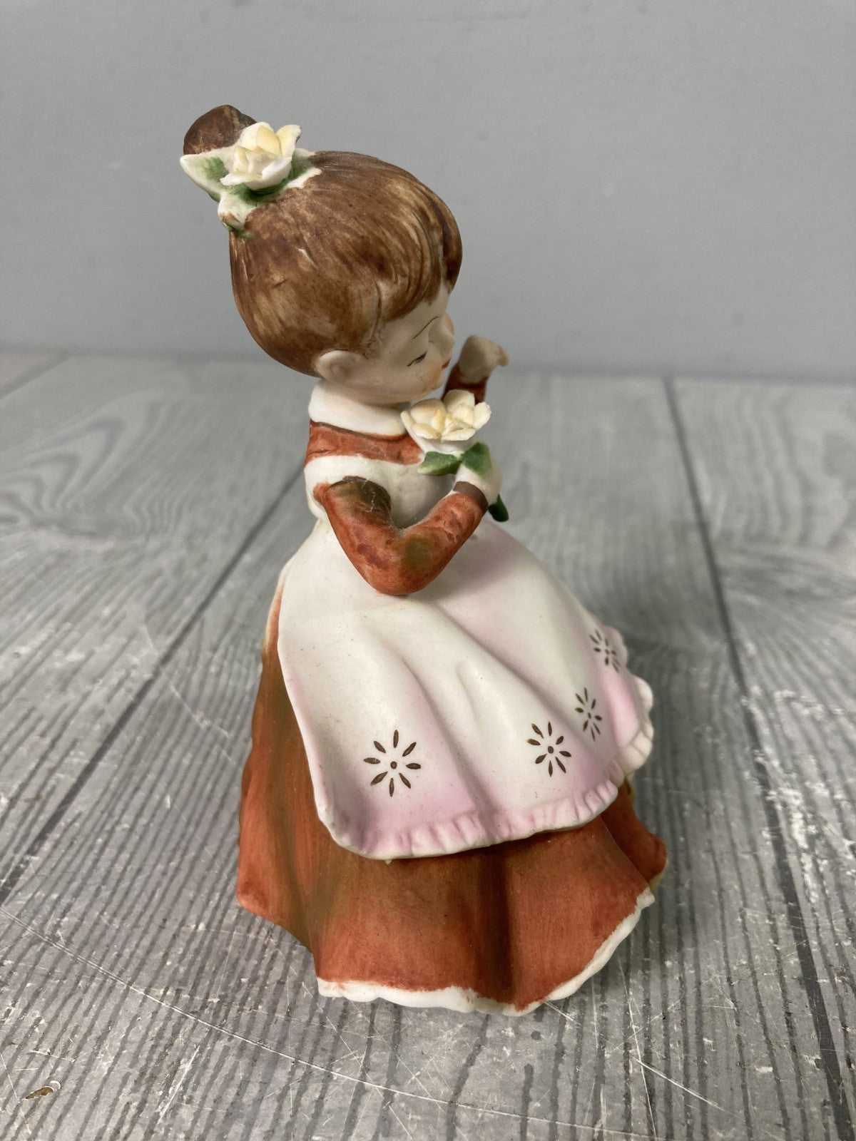 Vintage Lefton China Stamped Girl with Rose In Red Dress With Starburst Apron 