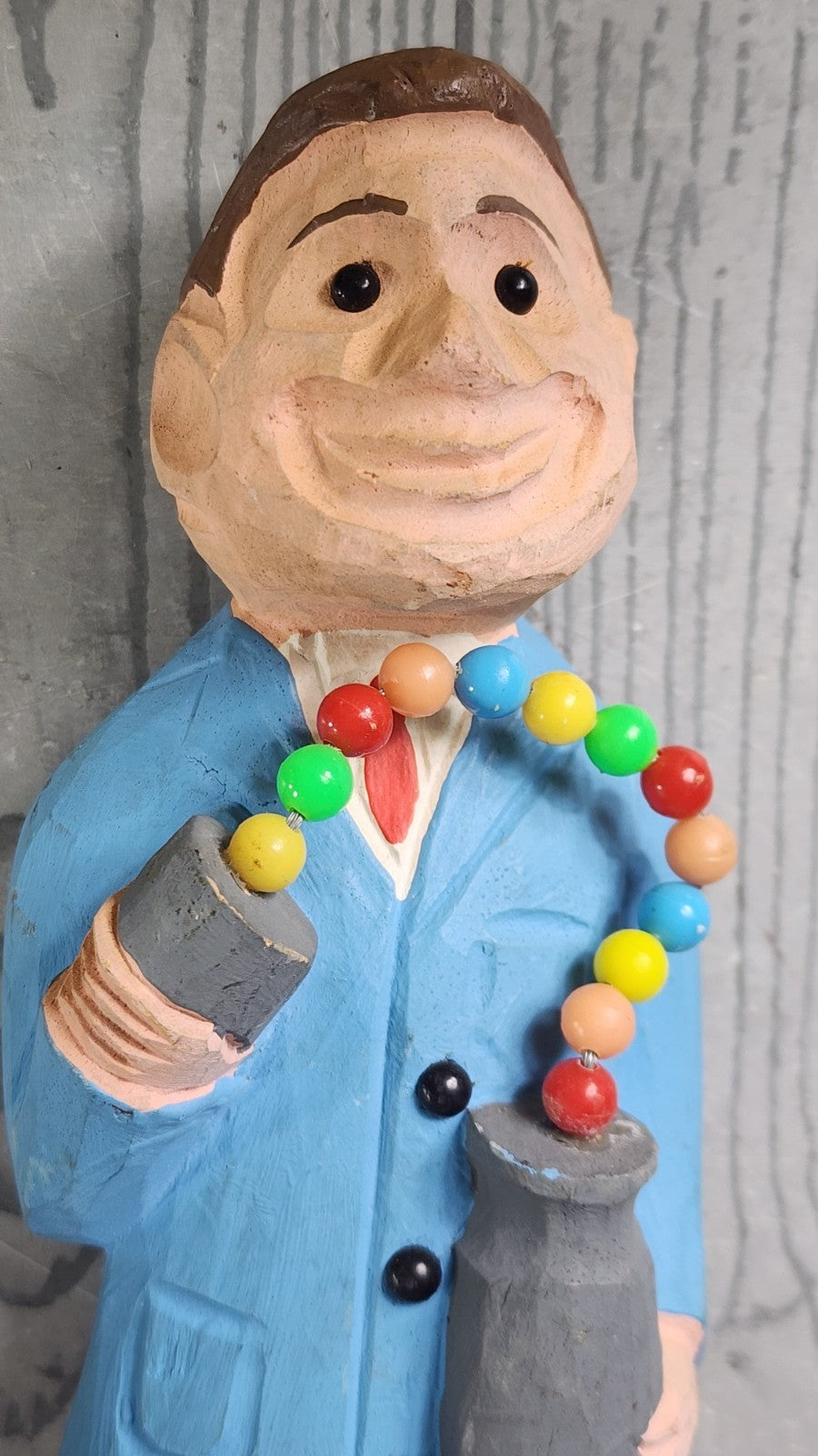 Vintage Hand Carved Wooden Statue Man Holding Cup-A-Ball Toy