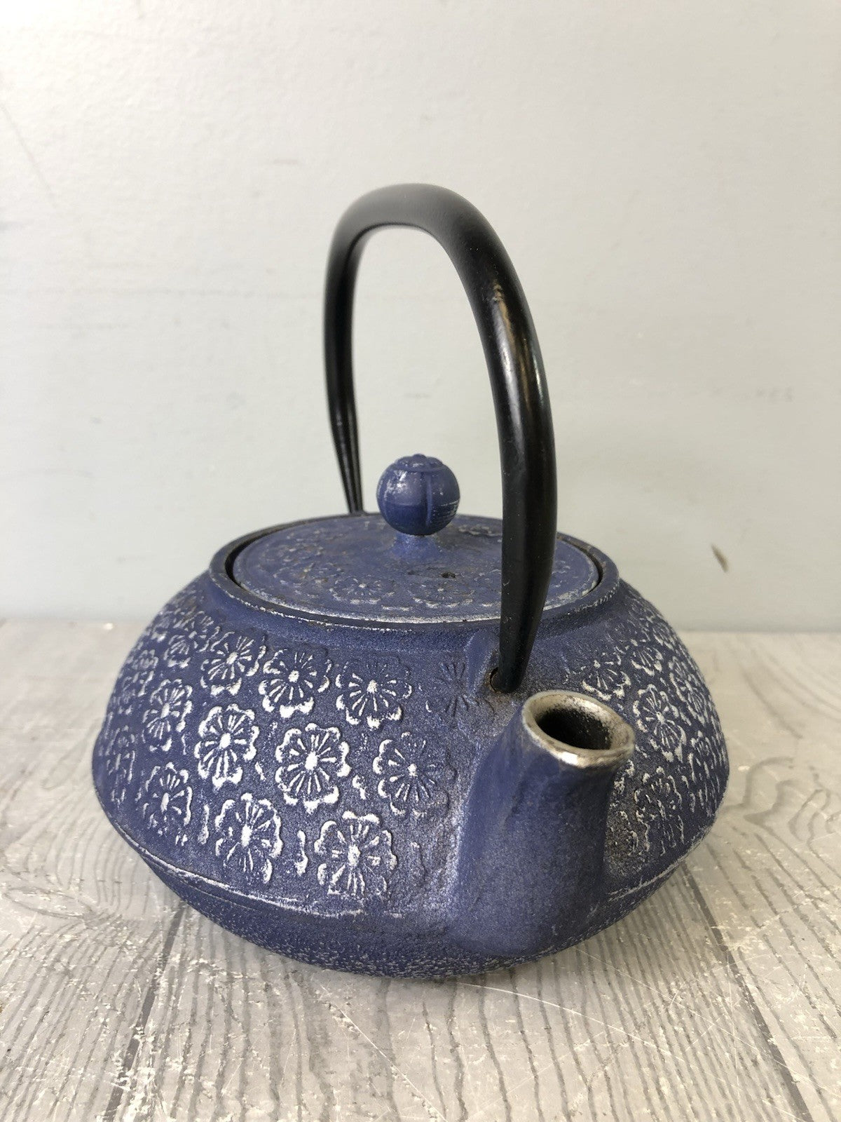 Cast Iron Ornamental Blue Teapot with Silver Flower Pattern and Black Handle