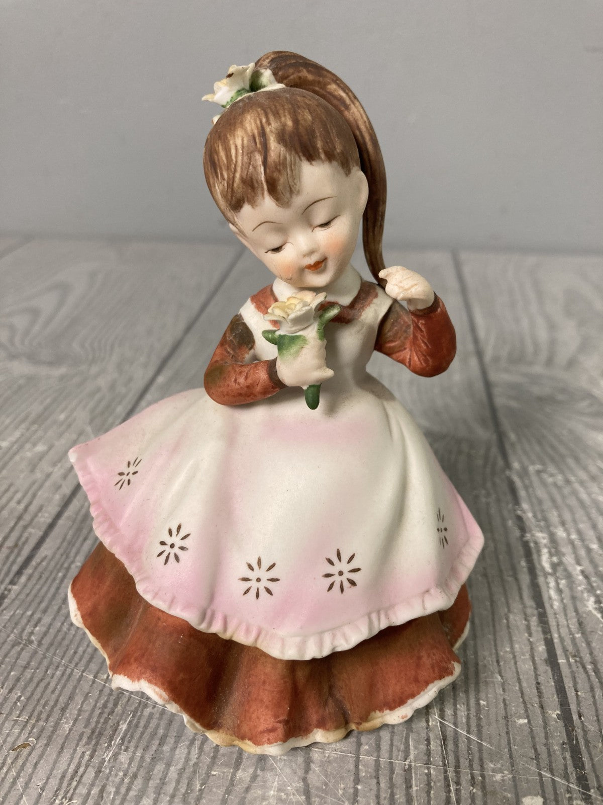 Vintage Lefton China Stamped Girl with Rose In Red Dress With Starburst Apron 