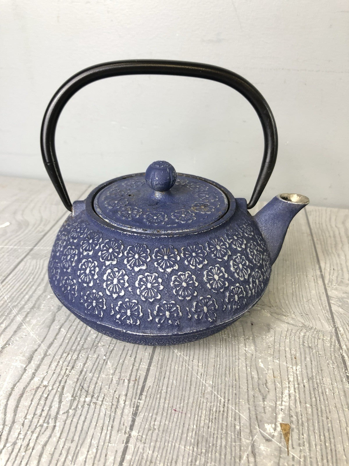 Cast Iron Ornamental Blue Teapot with Silver Flower Pattern and Black Handle