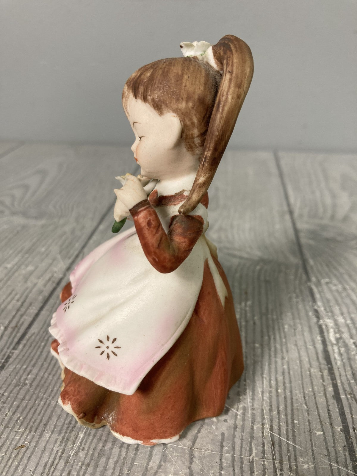 Vintage Lefton China Stamped Girl with Rose In Red Dress With Starburst Apron 