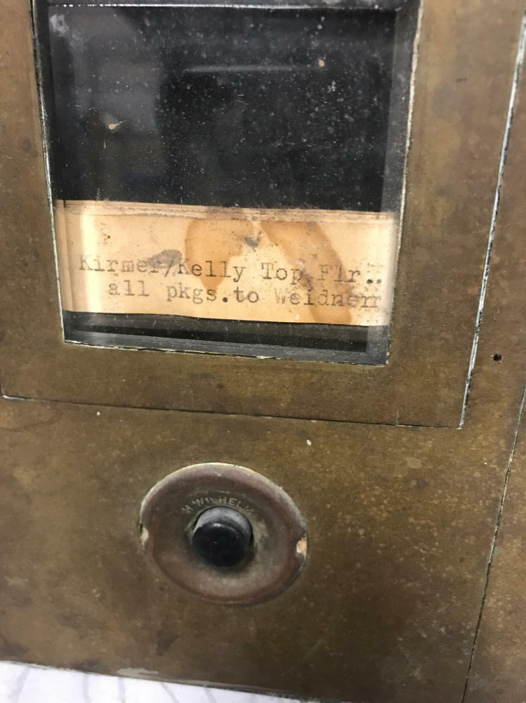 salvaged vintage mailbox and doorbell unit