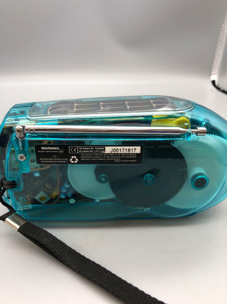 FREEPLAY Self Powered Solar AM/FM Emergency Radio Crank Clear Blue/Green - Good