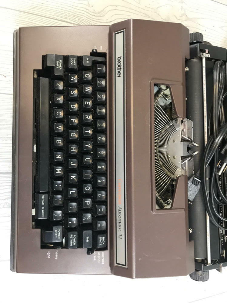 Brother Correct-O-Riter Electric Typewriter Model 3800 Brown in Black Case - Good