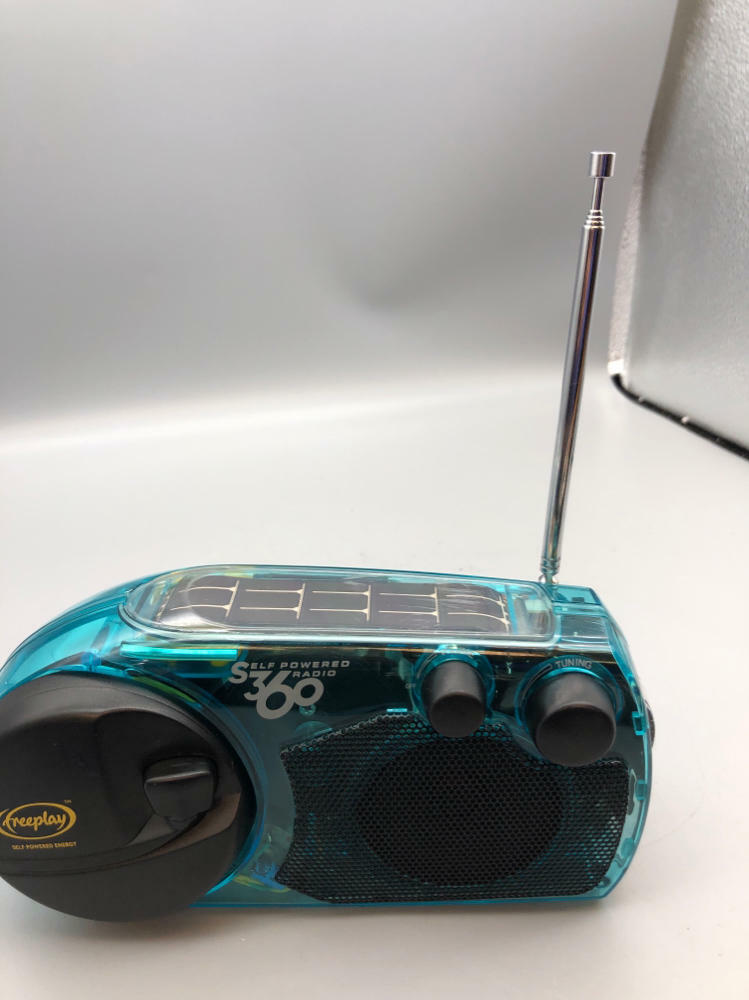 FREEPLAY Self Powered Solar AM/FM Emergency Radio Crank Clear Blue/Green - Good