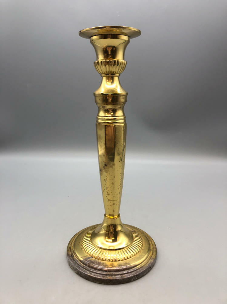 single gold candlestick
