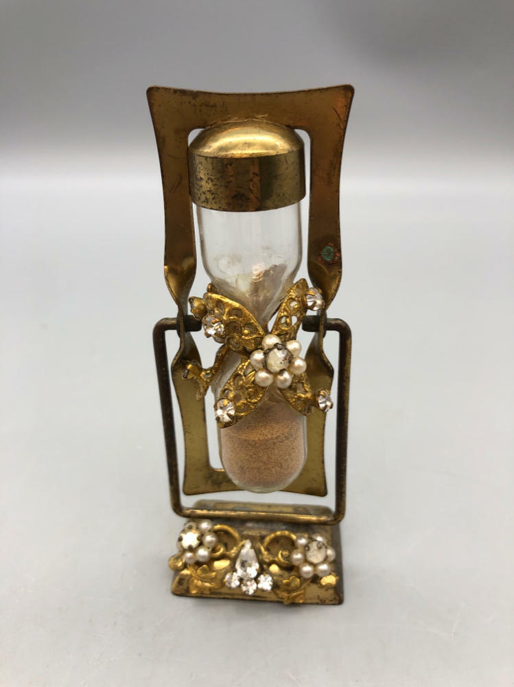 gem and pearl sand in a bottle