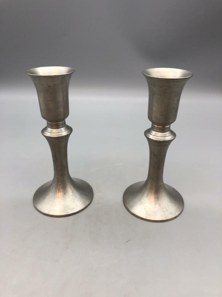 pair of silver candlesticks