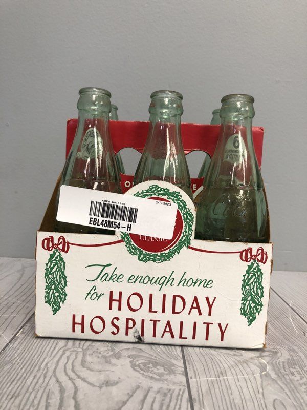Coca Cola Holiday Commemorative Pack Of 6 Collectible Bottles with Case